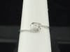 Round Solitaire Diamond Engagement Ring 10K White Gold Prong Set Swirl 0.11 Ct