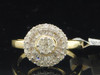 runder Halo-Verlobungsring mit Diamanten im Baguetteschliff aus 14 Karat Gelbgold, 0,69 ct.