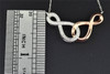 Diamond Double Infinity Pendant 10K White & Rose Gold 0.10 CT. Charm