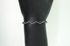 Black and White Diamond Infinity Twist Link Bracelet Ladies 10K White Gold 1 Ctw