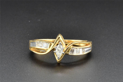 Anillo de compromiso con solitario de diamantes marquesa en oro amarillo de 14 k con talla baguette de 0,25 ct