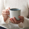 Denby Studio Grey White Ridged Mug In Hands