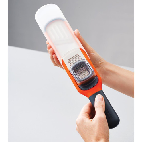 Orange Joseph Joseph Handi-Grate 2-in-1 Mini Grater and Slicer slicer