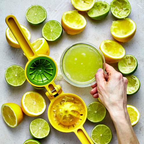 Yellow Joseph Joseph JuiceMax Dual-action Citrus Press juice