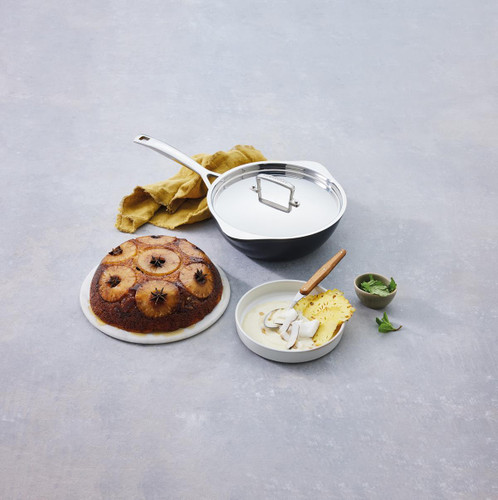 Le Creuset Toughened Non-Stick 24cm Chefs Pan With Pour Spout Lifestyle