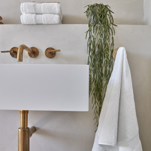 Christy Supreme Hygro Towel White Next To Bath