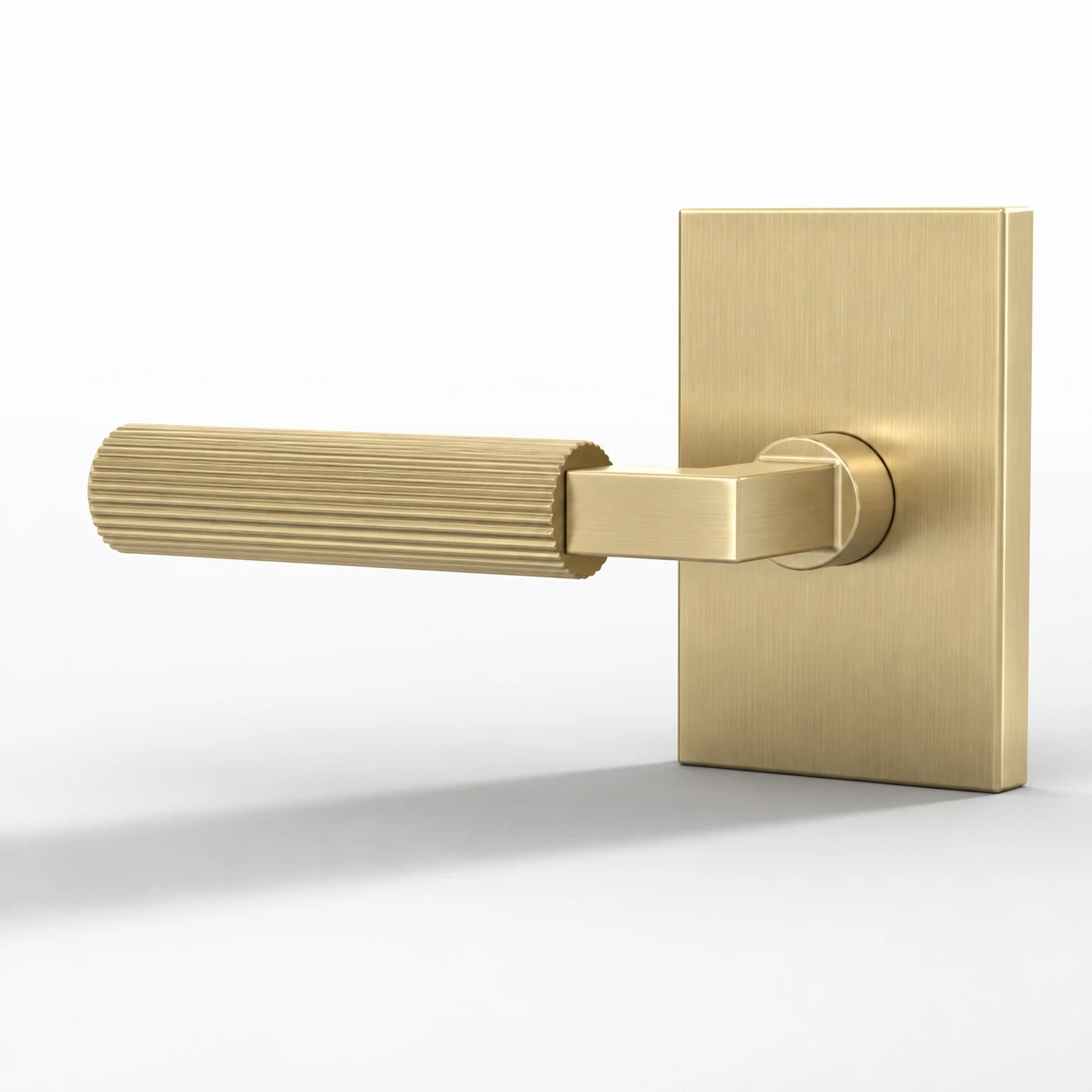Ridge satin brass grooved door lever with vertically brushed rectangular rosette