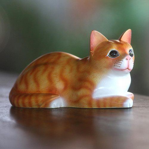 Signed Wood Sculpture of a Lying Cat in Orange from Bali 'Lying Cat in Orange'