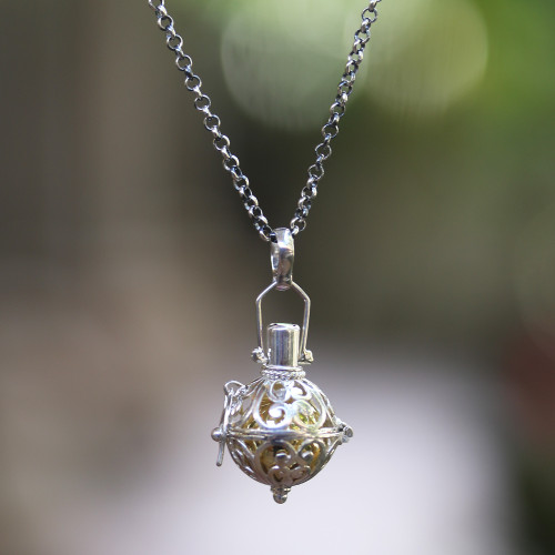 Silver and Brass Harmony Ball Necklace with Garnet 'Light of My Life'