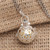 Silver and Brass Harmony Ball Necklace with Blue Topaz 'Sweet Chime'