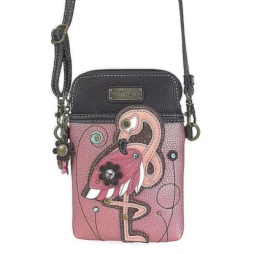 Small front pocket adorned featuring Toffy Dog
Adjustable strap - turn the bag into a purse, a crossbody bag, or even a pouch!
Top zipper closure
Soft inside lining
Extra padding throughout the bag to protect your cellphone
Materials used: Faux leather
Color: -Glitter Pink
Approx. Measurements: 5" x 0.75" x 7" 
Strap adjustable: 7"~28"