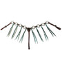 Emerald ring and tassel breast collar