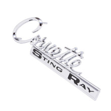 Trim Parts 1963-65 Chevrolet Corvette Rear “Corvette Sting Ray” Emblem W/Fasteners, Each - (5217)