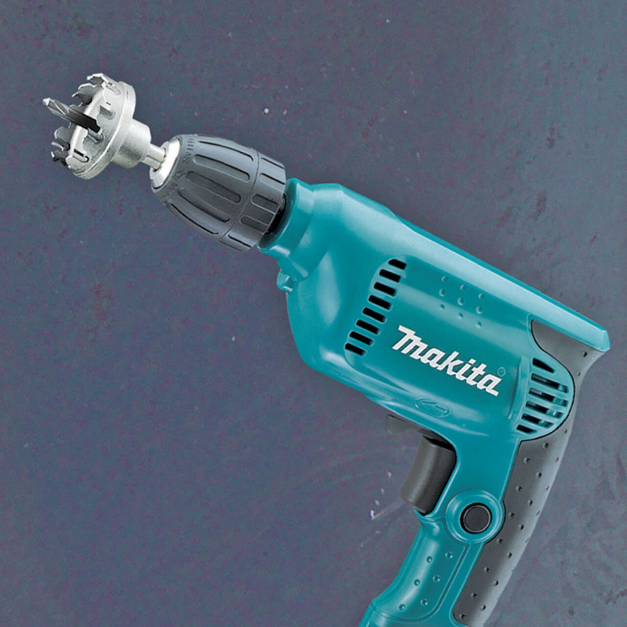 Makita 10mm (3/8”) Variable Speed Drill. 450W