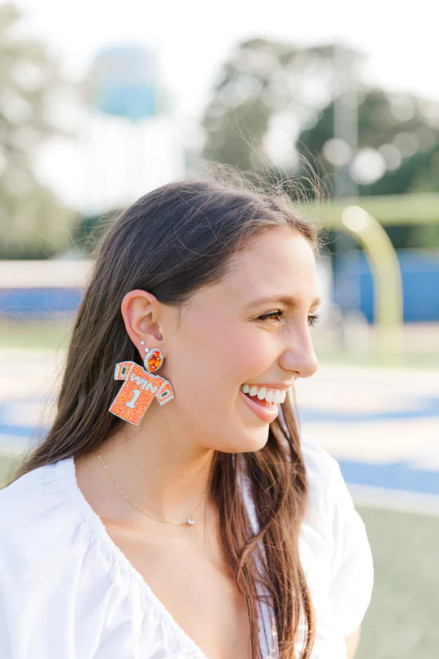 Orange beaded football jersey earring