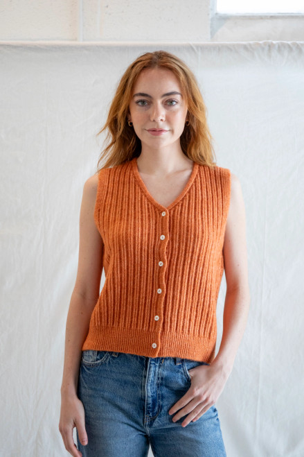 Button front loose fitting granny vest in rust