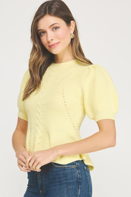 yellow short puff sleeve sweater with peplum hem