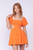 Orange mini dress with puff sleeves and side cutouts