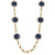 Worn gold chain necklace with pearl encircled dark denim medallions