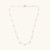 dainty gold necklace with floating pearls