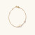 Dainty gold cross bracelet