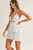 White eyelet lace mini dress with front cutout detail
