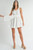 White mini dress with circle buckle