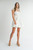 White mini dress with circle buckle