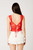 Red sheer top with open back and ties