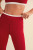 red legging with layered look at waistband