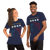 Unisex T-Shirt Game Of Life 70 Year Clock. Color NAVY. Identical graphic and text on front and back representing amount of time that elapses from birth to 70 years. Time frame shows number of Seconds, Minutes, Hours, Days, Weeks, Months. Graphic shows 4 circles representing four Quarters, as in sports. Text says, "Game Of Life - Time To Get Busy".  Sizes range from Extra Small (XS) to Four Extra Large (4XL). Great Gift for Family, Friends, Coworkers, and Others.