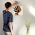 Enhanced Matte Paper Poster With Hanger 001. Oak Frame 16in x 16in (40.64cm x 40.64cm), Front View. Picture shows boho style drawing design with two brownish, irregular surface, geometric objects in the background and six leaf black branch in the foreground. Great Gift for Family, Friends, Coworkers, Self, and Others.