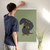Enhanced Matte Paper Poster With Hanger 003. White Frame 24in x 36in (60.96cm x 91.44cm), Front View. Picture shows drawing of puppy with large Beagle style eyes. Great Gift for Family, Friends, Coworkers, Self, and Others.