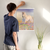 Enhanced Matte Paper Poster With Hanger 005. White Frame 18in x 24in (45.72cm x 60.96cm), Front View. Picture shows white horse galloping in a field of colorful wildflowers. Great Gift for Family, Friends, Coworkers, Self, and Others.