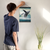 Enhanced Matte Paper Poster With Hanger 006. Black Frame, 12in x 16in (30.48cm x 40.64cm), Front View. Picture shows fantastical scene of whale breaching above clouds, not water. Great Gift for Family, Friends, Coworkers, Self, and Others.