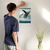 Enhanced Matte Paper Poster With Hanger 006. White Frame 12in x 18in (30.48cm x 45.72cm), Front View. Picture shows fantastical scene of whale breaching above clouds, not water. Great Gift for Family, Friends, Coworkers, Self, and Others.