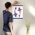 Enhanced Matte Paper Poster With Hanger 007. Black Frame, 16in x 20in (40.64cm x 50.80cm), Front View. Picture shows two colorful fish swimming side by side in opposite directions. Great Gift for Family, Friends, Coworkers, Self, and Others.