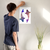 Enhanced Matte Paper Poster With Hanger 007. White Frame 12in x 18in (30.48cm x 45.72cm), Front View. Picture shows two colorful fish swimming side by side in opposite directions. Great Gift for Family, Friends, Coworkers, Self, and Others.