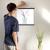 Enhanced Matte Paper Poster With Hanger 011. Black Frame, 18in x 18in (45.72cm x 45.72cm), Front View. Picture shows drawing of water in glass vase with branches sprouting colorful pink and yellow flower buds. Great Gift for Family, Friends, Coworkers, Self, and Others.