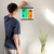 Enhanced Matte Paper Poster With Hanger 012. Black Frame, 12in x 12in (30.48cm x 30.48cm), Front View. Picture shows abstract drawing of two faces with different background colors and different colors highlighting facial features. Great Gift for Family, Friends, Coworkers, Self, and Others.