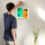 Enhanced Matte Paper Poster With Hanger 012. Oak Frame 14in x 14in (35.56cm x 35.56cm), Front View. Picture shows abstract drawing of two faces with different background colors and different colors highlighting facial features. Great Gift for Family, Friends, Coworkers, Self, and Others.