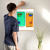 Enhanced Matte Paper Poster With Hanger 012. Oak Frame 18in x 24in (45.72cm x 60.96cm), Front View. Picture shows abstract drawing of two faces with different background colors and different colors highlighting facial features. Great Gift for Family, Friends, Coworkers, Self, and Others.