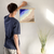 Enhanced Matte Paper Poster With Hanger 015. Oak Frame 14in x 14in (35.56cm x 35.56cm), Front View. Picture shows drawing of a beach as if looking from the sky. The top left corner shows dark blue and a whale swimming, with two lighters shades of blue blending into five shades or brown moving toward the lower right corner. Great Gift for Family, Friends, Coworkers, Self, and Others.