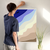 Enhanced Matte Paper Poster With Hanger 015. White Frame 24in x 36in (60.96cm x 91.44cm), Front View. Picture shows drawing of a beach as if looking from the sky. The top left corner shows dark blue and a whale swimming, with two lighters shades of blue blending into five shades or brown moving toward the lower right corner. Great Gift for Family, Friends, Coworkers, Self, and Others.