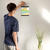 Enhanced Matte Paper Poster With Hanger 016. Black Frame, 8in x 10in (20.32cm x 25.40cm), Front View. Picture shows boho style drawing representing a sunset over hill-like shapes of green, blue, and orange. Great Gift for Family, Friends, Coworkers, Self, and Others.