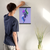 Enhanced Matte Paper Poster With Hanger 019. Black Frame, 12in x 18in (30.48cm x 45.72cm), Front View. Picture shows boho design art drawing of peacock style birds with colorful abstract feathers earrings. Great Gift for Family, Friends, Coworkers, Self, and Others.