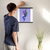 Enhanced Matte Paper Poster With Hanger 019. Black Frame, 16in x 16in (40.64cm x 40.64cm), Front View. Picture shows boho design art drawing of peacock style birds with colorful abstract feathers earrings. Great Gift for Family, Friends, Coworkers, Self, and Others.