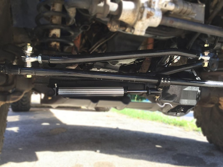 Drag link is bent twice for perfect heim angles so the steering does not bind up during suspension travel.