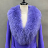 A "Purple Fox-Trimmed Wool Coat" is a stylish and elegant outerwear piece designed for both warmth and fashion. This coat features luxurious fox fur trimmings in a striking purple color, adding a touch of opulence to a classic woolen design.