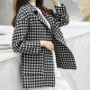 A houndstooth wool coat is a classic and stylish outerwear piece, characterized by its distinctive houndstooth pattern. Crafted from high-quality wool, it offers both warmth and a timeless fashion statement. Explore our selection of houndstooth wool coats to stay cozy and fashionable in colder seasons.